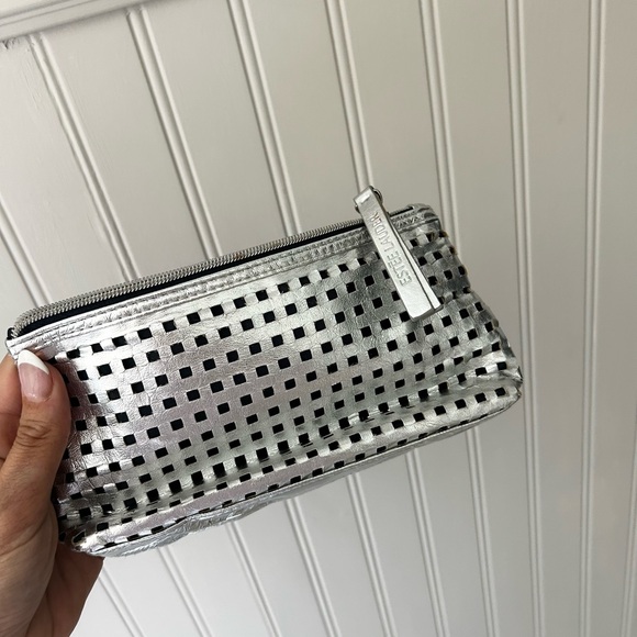 Estee Lauder Handbags - Estee Lauder Silver Perforated Cosmetic Bag Zipper Pouch
